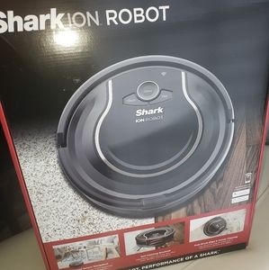 Shark Ion Robot includes charging dock...